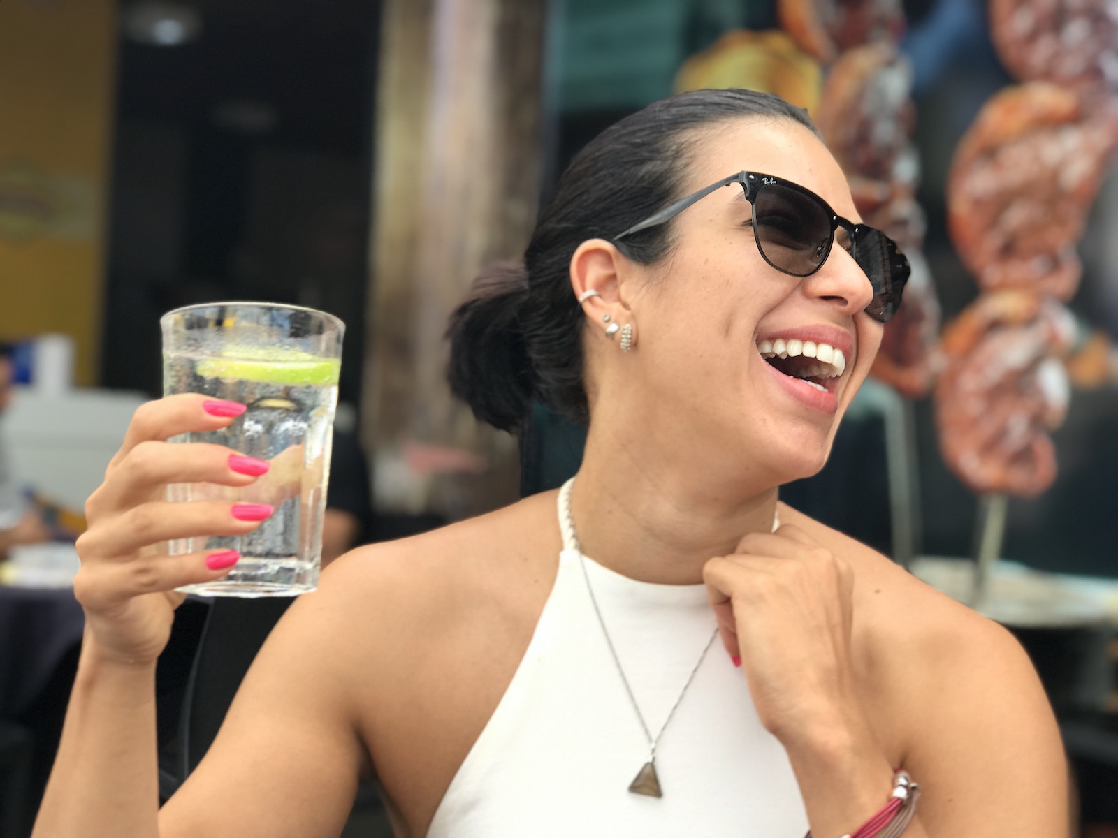 A Woman Holding a Glass of Water